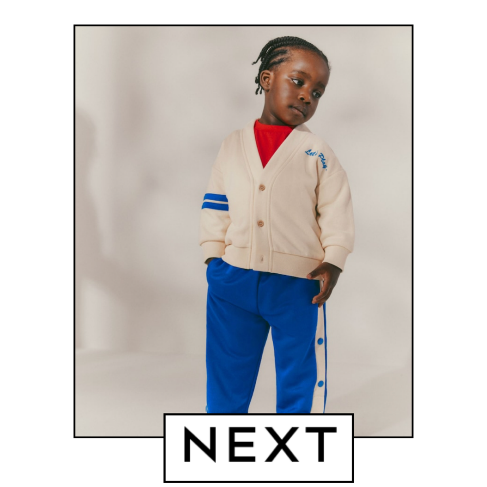 LACARA CHILD MODEL WEARING NEXT CLOTHES, CARDIGAN AND BLUE JOGGERS SET